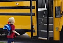 File photo of a child about to board a school bus.