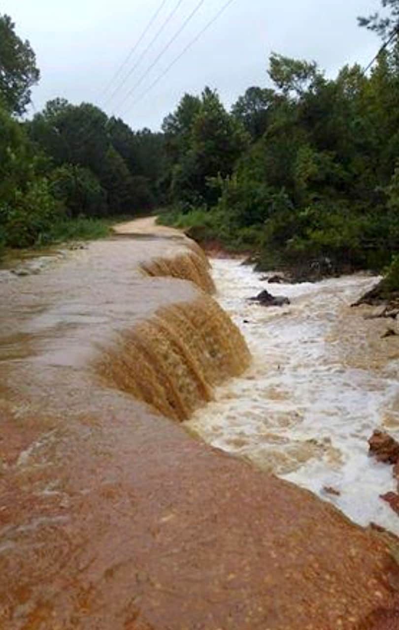 A road is washed out by flooding from Tropical Storm Gordon