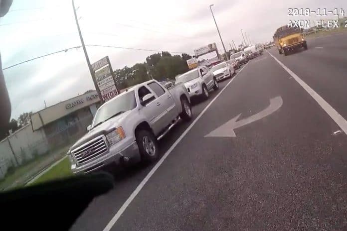 Body cam image of motorists being pulled over.