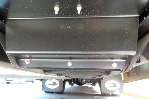 Propane fuel tank underneath a school bus.
