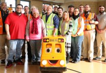 Recognized East Aurora, Illinois bus drivers pose with Buster the School Bus after a "Love the Bus" assembly held Feb. 8, 2019. (All photos are courtesy of ASBC.)