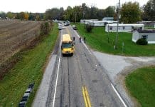 Photo from the NTSB report on State Route 25 in the aftermath of three siblings being hit and killed by a motorist who illegally passed the stopped school bus in rural Rochester County, Indiana. (Source: Fulton County Sheriff’s Office.)