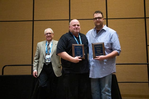Pictured from left are: Bud Fears, central states regional sales manager for TSD Roadeo sponsor Q'STRAINT/Sure-Lok, with Logan Heckathorn and Stuart Stutzman of Plano ISD, who came in first place at the 2019 TSD Roadeo competition.