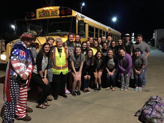 The SVHS Math Team is pictured with Judy Scott after Scott safely parked her bus after losing all power. (Photo courtesy of SV196 District Superintendent Jason Henry.)