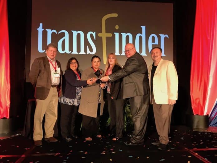 Routing department specialists for Humble ISD receiving the Transfinder Ambassador of the Year Award. Steve Silence is pictured second from the right. (Photo courtesy of Jerry Burd.)
