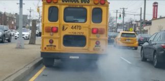 Soot coming from an older school bus tailpipe. Newer diesel emits 1/60th the soot of year 2000 models. (File photo.)