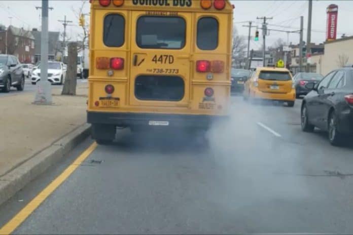 Emissions from the tailpipe of a school bus.