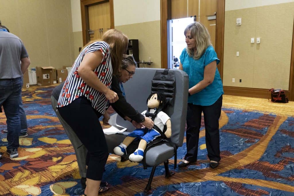 STN EXPO Indy Attendees Train on Child Restraints, School Bus