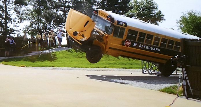 The school bus literally flew off the steel ramp during the crash demonstration at the IMMI facility.