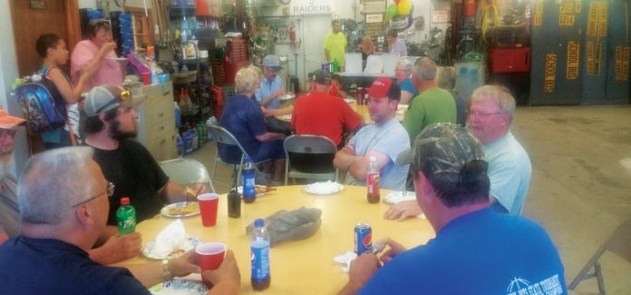 Bus Drivers at Anamosa School District in Iowa regularly gather for meals, such as their annual end of school year party.