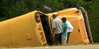 A school bus in Mississippi drove off the road and rolled several times. The school bus driver died and seven students were injured on Sept. 10, 2019. Photo courtesy of CBS News.