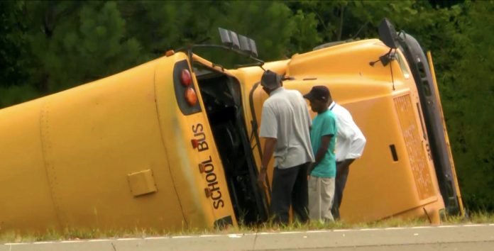 A school bus in Mississippi drove off the road and rolled several times. The school bus driver died and seven students were injured on Sept. 10, 2019. Photo courtesy of CBS News.