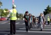 Clark County School District students in Las Vegas cross the street with the help of a crossing guard. (Photo courtesy of CCSD.)