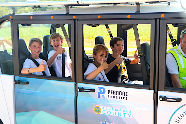 AVNU riders giving their opinion on their autonomous shuttle ride.