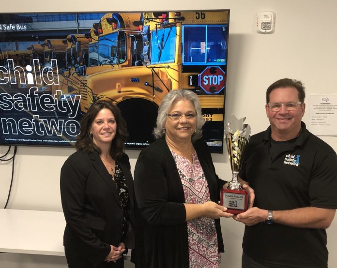 From left to right: Andrea DiSpirito, TSA, Susan Miller, state director of pupil transportation, and Ward Leber, founder of Child Safety Network, after Leber awarded Miller with an award for her school bus security efforts in Colorado.