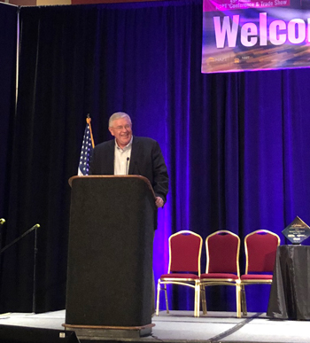 Ken Hedgecock addresses the NAPT audience after accepting his Lifetime Achievement Award on Monday, Nov. 4, 2019.