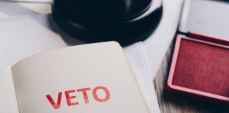 Red veto stamp in notepad