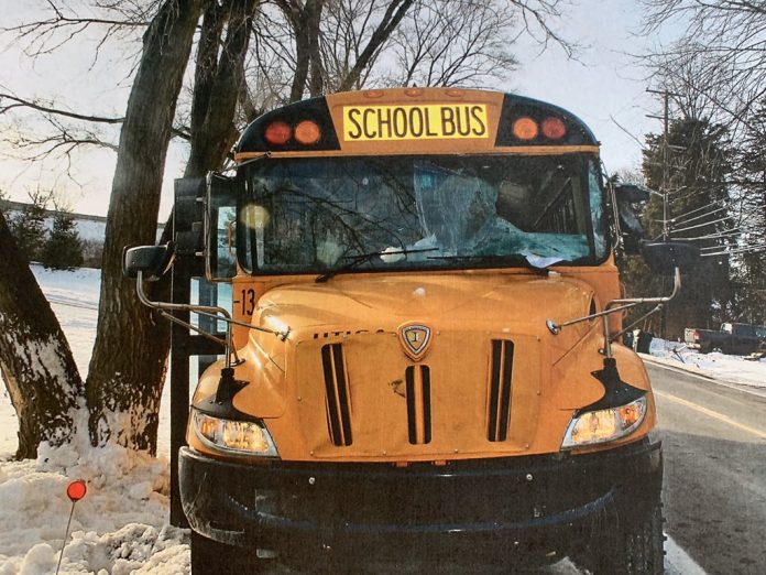 A sheet of ice, believed to have come off of the roof of a box truck, struck a school bus windshield on Jan. 21 in Michigan. The bus driver and one student reported minor injuries. Twitter/Jenn Schanz