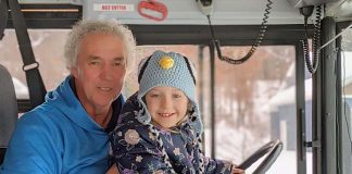 Wisconsin school bus driver Rick Krause with student Arianna Peggs. Krause said he loves developing caring relationship with his students and their parents. Facebook/Parenting the Principal.