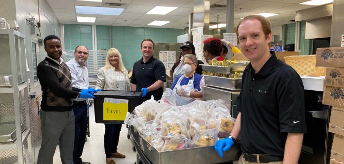 ALC Schools staff picks up food at Hickman Mills School District in Missouri for delivery to students.