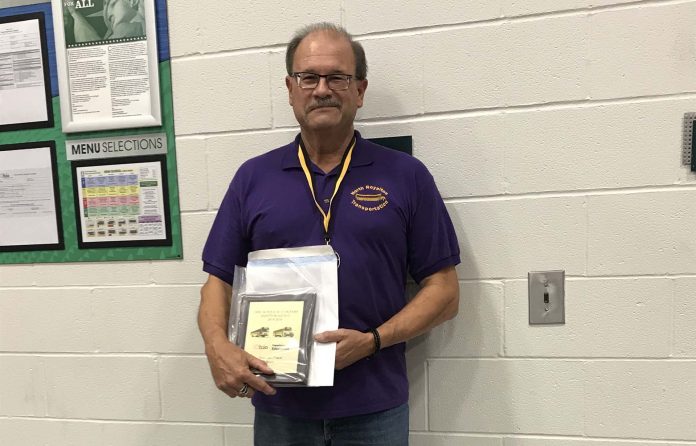 Bruce Abbott, a school bus driver and on-bus instructor for North Royalton City Schools, won the George Sontag Jr. Award for the Ohio School Bus Driver of the Year. The award was presented by the Ohio Association for Pupil Transportation.