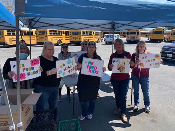 Paso Robles Joint Unified School District transportation staff assisting with meals. The districts meal delivery program started on March 18, when schools closed, and the department only took one week off this summer. (Photo courtesy of Paso Robles Joint Unified School District.)
