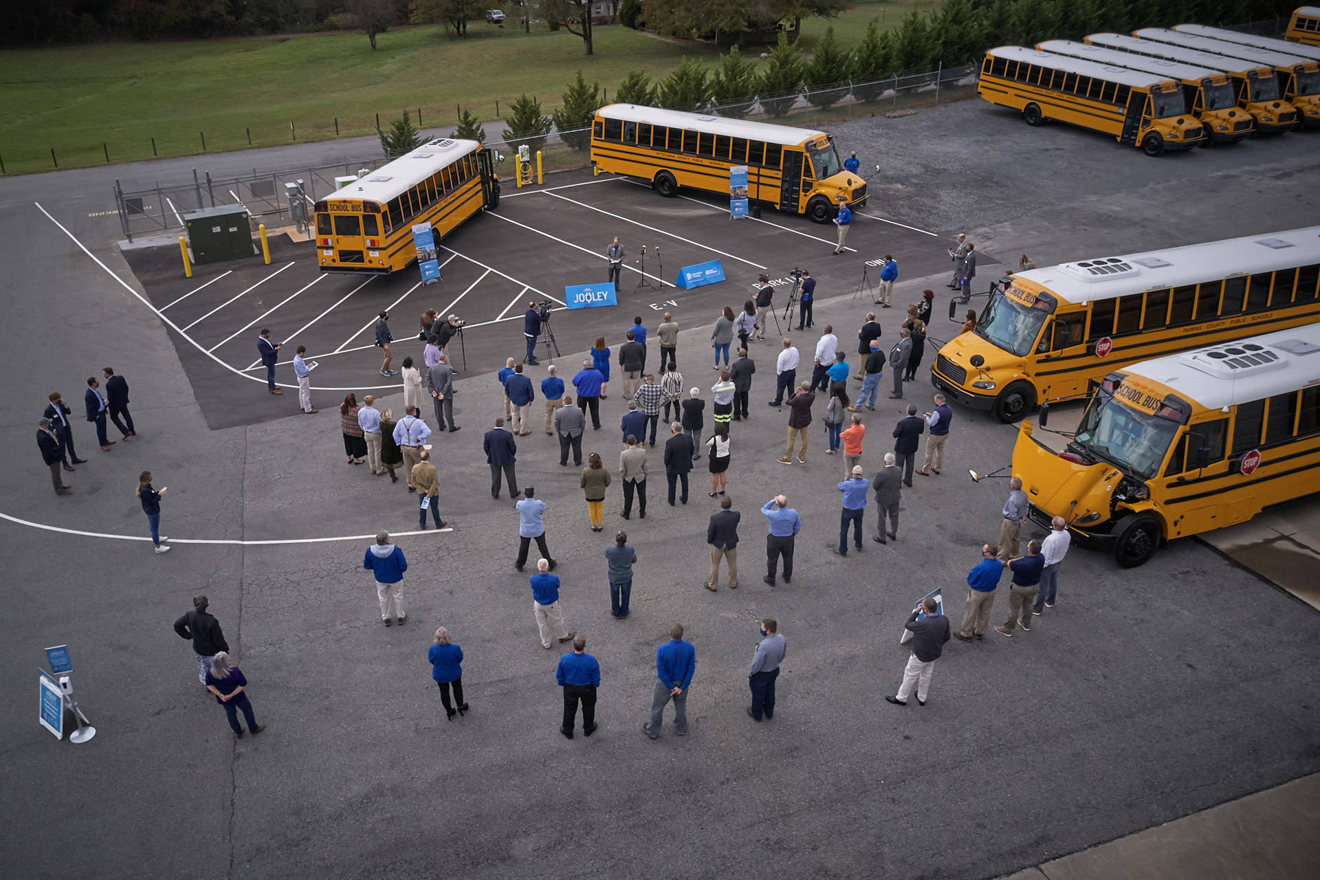 Representatives from Thomas Built Buses, Proterra, Dominion Energy, Sonny Merryman, and the Commonwealth of Virginia gather to celebrate the delivery of the first group of Saf-T-Liner C2 Jouley electric school buses delivered to Virginia schools as part of phase one of Dominion Energy’s Electric School Bus Initiative.