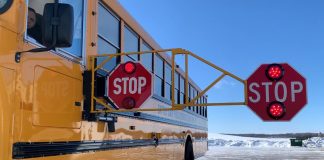 Photo of the Extended Stop Arm in use on a Battle Lake, Minnesota school bus. (Photo courtesy of Bus Safety Solutions.)