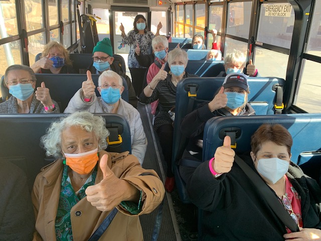 Clay County residents are transported to a vaccine clinic onboard a North Kansas City School bus. (Image courtesy of North Kansas City Schools)