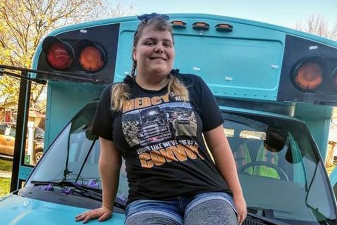 Piper the blue school bus and owner Ashley DeMoss, a rising transportation star in Michigan who happens to also live with autism.