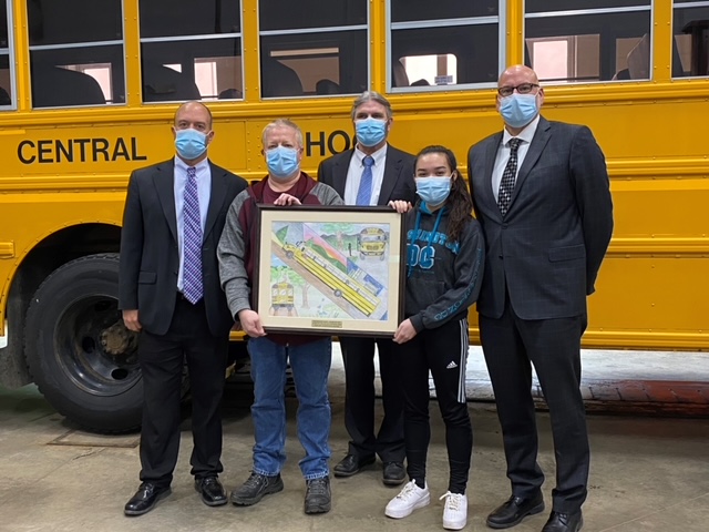 Larry Welty, Principal of Portville Central High School; Dave Youngs, Portville Bus Garage Superintendent; David Rindo, Leonard Bus Sales Transportation Advisor; Jacqueline Daley, Portville Central School senior and scholarship winner; Tom Simon, Portville Central School Superintendent