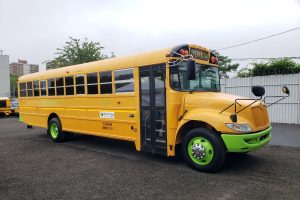 A diesel-to-electric repowered school bus in operation for Logan Bus in New York City. Photo courtesy of Unique Electric Solutions (UES).a