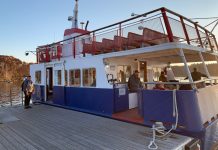Ann Kirkpatrick, superintendent of the Chebeague Island School District in Maine waits to board "The Islander" ferry boat from an island off the coast of Maine to school on the mainland.