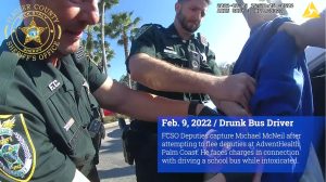 A Flagler County Sheriff's deputy body cam shows school bus driver Mark McNeil being arrested for driving under the influence with 40 students on board.