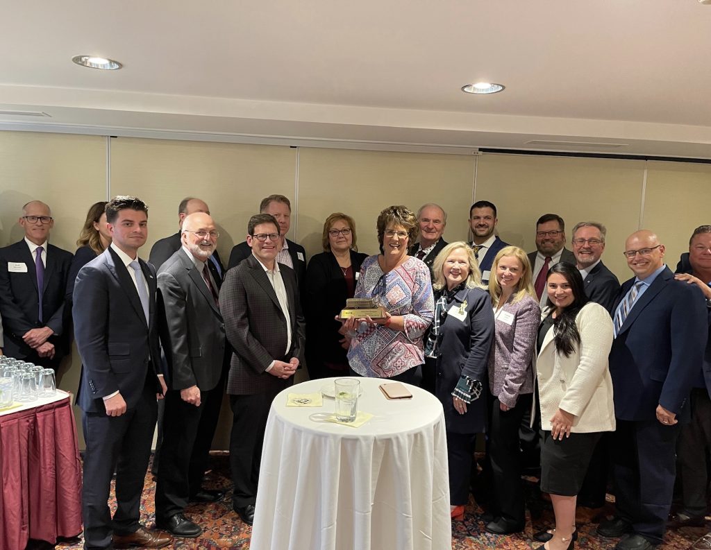 NSTA members present Rep. Jackie Walorski with the Bronze Bus Award for her leadership on the STOP for School Buses Act. (Photo courtesy of NSTA.)