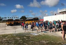 Families of 2022 Special Olympics USA athletes make their way from school buses to the games venue last week in Orlando, Florida.