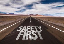 Safety First written on desert road