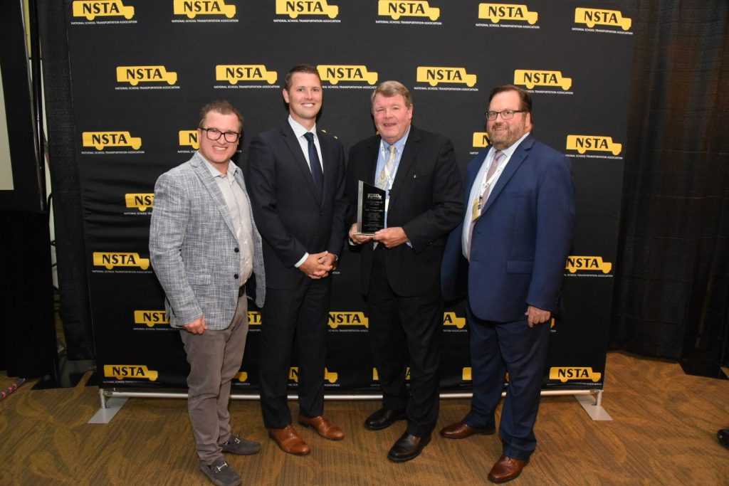 From left: STN Publisher and President Tony Corpin, Patrick Dean, Kellie Dean, and NSTA Executive Director Curt Macysyn.