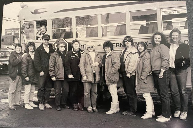 Alan Zuk, wearing hat at left, with the school district's drivers in the late 1980s.
