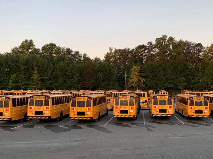 Charlotte-Mecklenburg school buses parked at a facility. (Source: Facebook/CMS Buses)