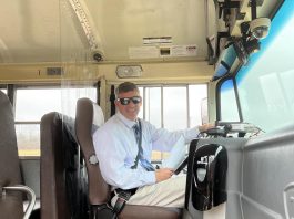 Huber Heights City Schools Superintendent Jason Enix fills in as a substitute school bus driver as needed amid the school bus driver shortage.