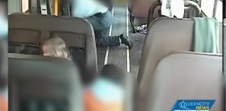 A still image from a Chesterfield, South Carolina school bus video shows a student attacking a nonverbal 4-year-old girl in 2018. (Image taken from YouTube/Queen City News)