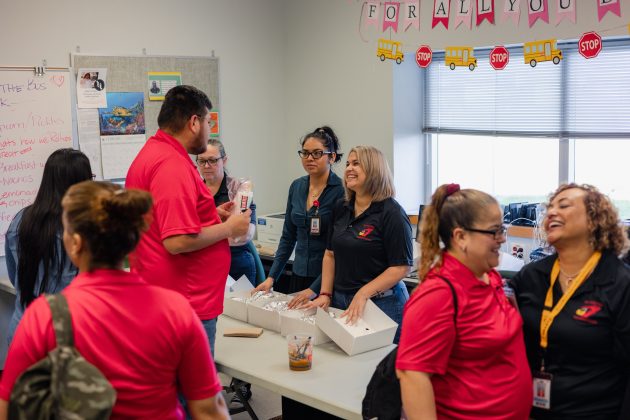 Superintendent Dr. Tielle of Del Valle ISD in Texas brought tacos for the districts' transportation staff during Love the Bus Month