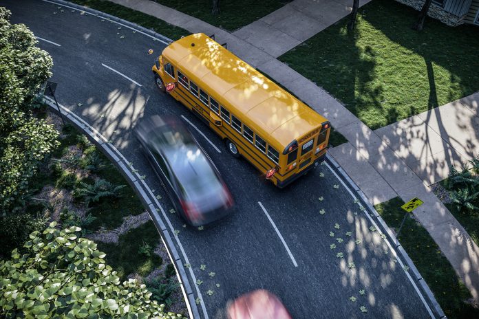 A bird's-eye view of a motorist illegally passing a school bus. (Photo courtesy of BusPatrol.)