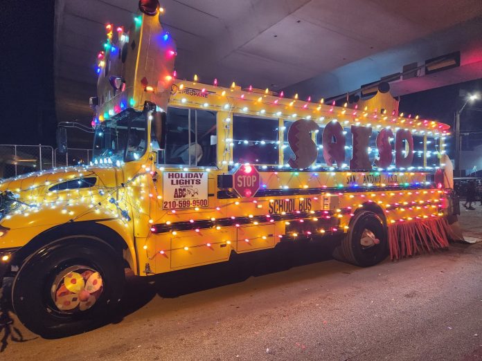 San Antonio ISD's entry in Fiesta Flambeau Parde, said to be the nation's largest illuminated parade, during the city's Fiesta in April 2023.