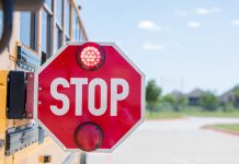 When the stop arm is extended and the lights are flashing, drivers must stop to keep children safe.