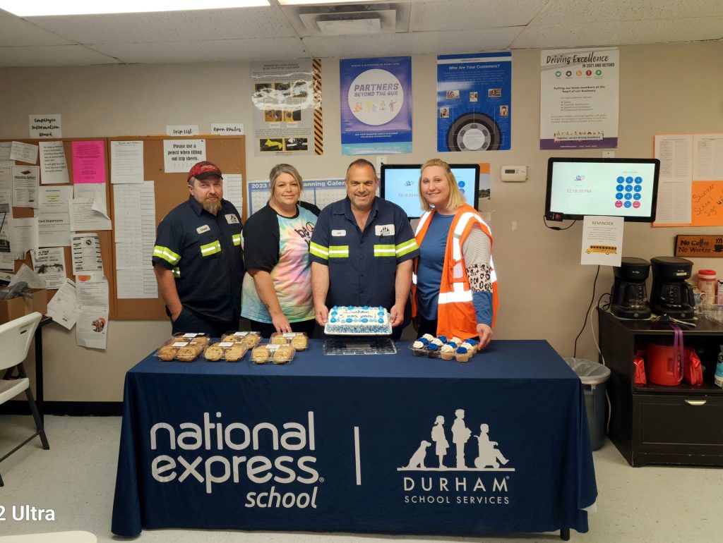 From left: Chad Wiethuchter (technician), Maria Deacon (safety training supervisor), Joe Triolo (maintenance supervisor), and Karen Habel (operations supervisor) celebrating the Durham School Service partnership renewal wit the Northwest R-1 School District in Missouri.