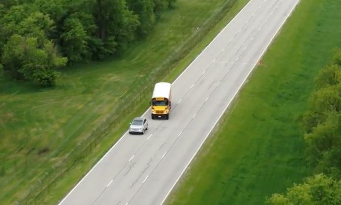 Still image of an overhead video showing school bus electronic stability control at work during a test. (File photo.)