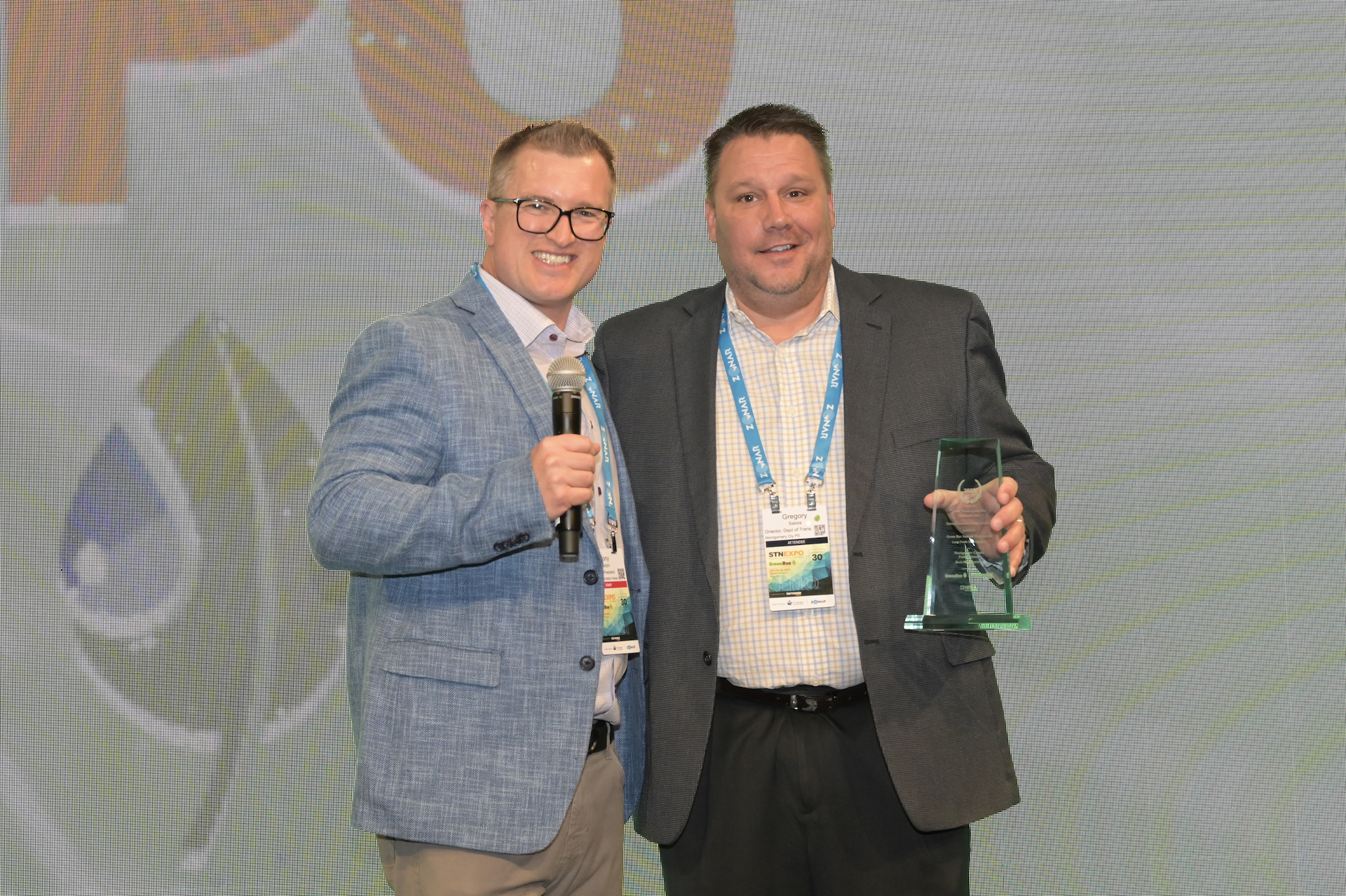 Gregory Salois, director of transportation at Montgomery Public Schools, poses with STN Publisher Tony Corpin. MCPS is the winner of the 2023 Large Public Fleet for the Green Bus Summit Fleet Awards (Photo by Philicia Endelman.) 