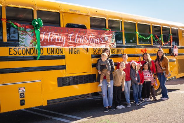 Lupe Del Bosque, transportation dispatcher at Escondido Union High School District in California shared photos of the district’s 2023 parade featuring transportation staff with their families, including the director of transportation, a school bus driver and a dispatcher.